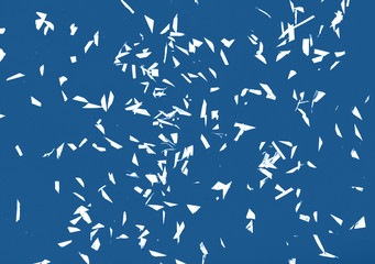 Silver sparkles on blue background