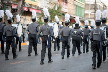 Close up and details of playing musicians, instruments in a marching, show band or music band