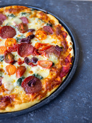 Chorizo, tomato and mozzarella cheese pizza