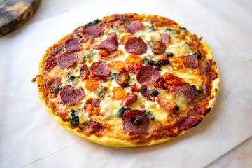 Chorizo, tomato and mozzarella cheese pizza