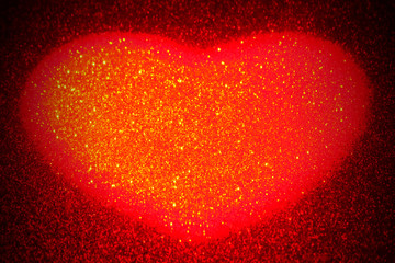 Abstract red heart shaped background. Sparkles like red-hot lava. Blank for design for valentines day or wedding. Copy space.