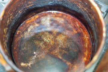 Frying pan with olive oil on the stove