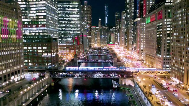 CTA Holiday Train Crosses over Chicago River at Night