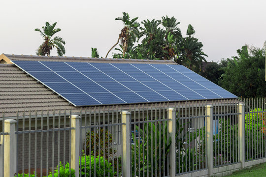 electric solar panals on tiled roof