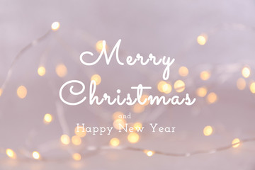 Naklejka premium White background with bokeh lights. Holiday Christmas and New Year background. Horizontal with Seasonal greetings