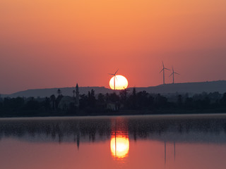 windmills in sunset