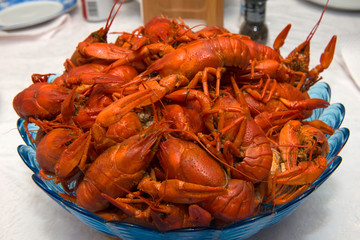 Crayfish boiled on a plate on the table before eating