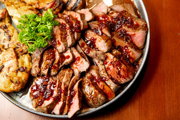 Fresh, juicy assorted sliced grilled meat.