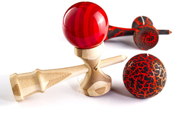 Kendama japanese wooden toy on isolated on white. Wood toy s in black and orange color and traditional bamboo wood
