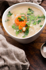 Barley soup, pearl barley in white bowl