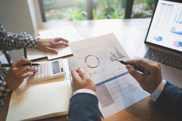 Financial analyst calculating with number documents, Investment concept.