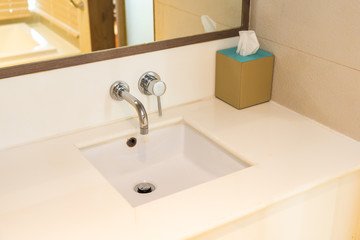 Water facuet and white sink decoration interior