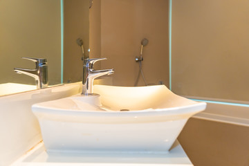 Water facuet and white sink decoration interior