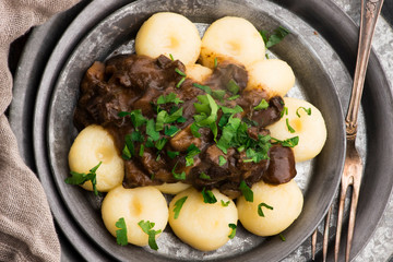 Potato dumplings and forest mushroom sauce