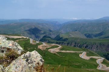 Fototapeta na wymiar Nature landscape. Winding mountain road. Caucasus 