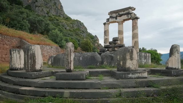 Tholos with Doric columns at the Athena Pronoia temple ruins in Delphi, Greece