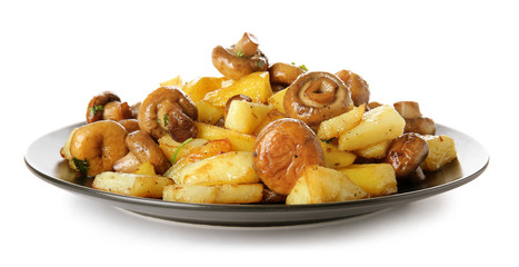 Plate with tasty cooked mushrooms and potato on white background