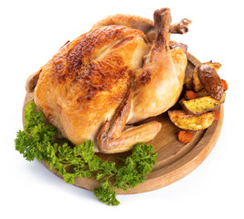 Board with baked chicken and potato on white background