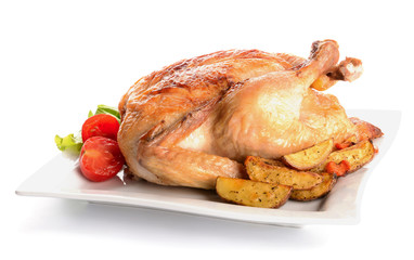 Plate with baked chicken and potato on white background