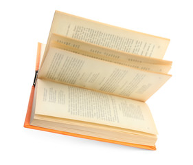 Open old book with orange cover isolated on white