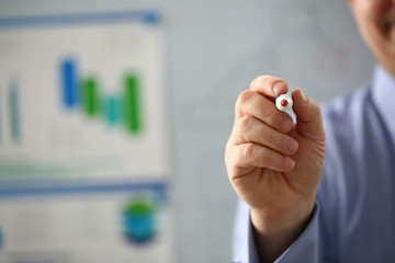 Male hand hold marker on white board problem