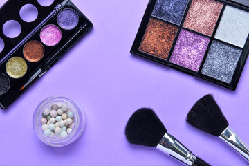 Set of decorative cosmetics on color background