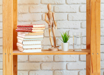 Wooden rack shelf with home decor stuff