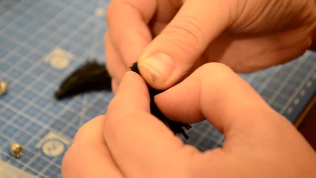 Work with genuine leather.Video footage