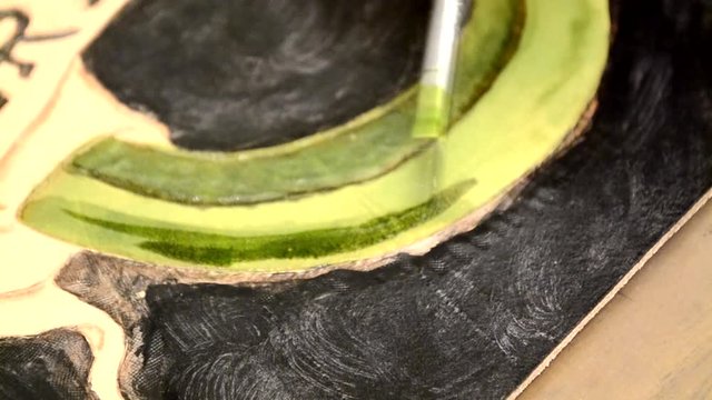 Paint on a genuine leather product