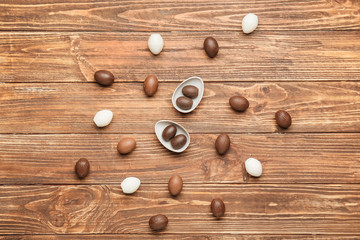 Chocolate Easter eggs on wooden background
