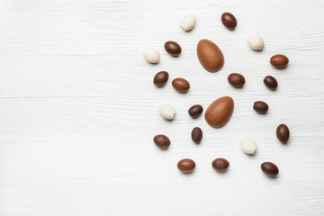 Chocolate Easter eggs on wooden background