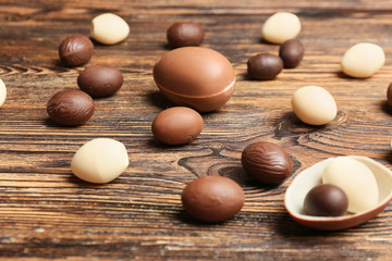 Chocolate Easter eggs on wooden background