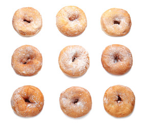 Sweet tasty donuts on white background