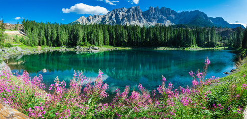 Panoramic beautiful view of Carezza lake with Latemar Mountain, Trentino-Alto Adige Region,...