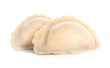 Raw dumplings on white background