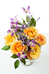Yellow roses and purple clematis