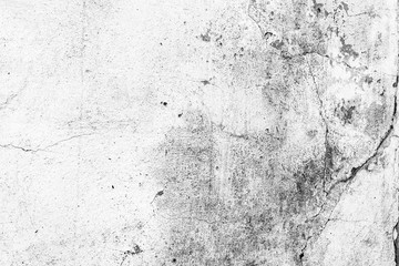 Texture of a concrete wall with cracks and scratches which can be used as a background