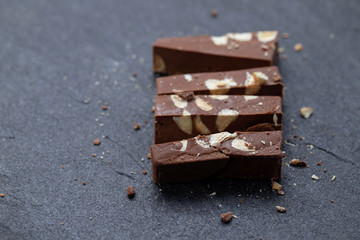 chocolate turron on ceramic background