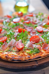 pizza with tomatoes and mozzarella