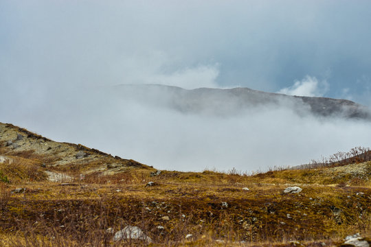 nathang valley mountains in the fog