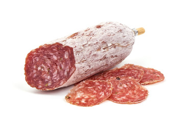 Cured salami sausage, Italian cuisine, isolated on white background - obrazy, fototapety, plakaty