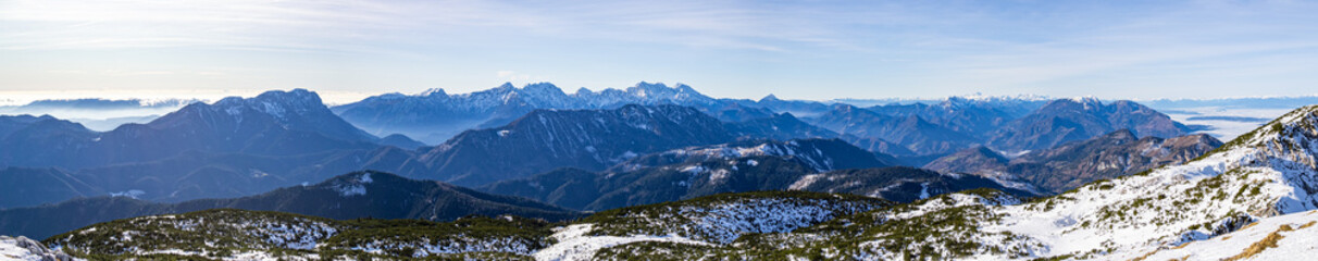 Fototapeta na wymiar Panoramic view of the Julian Alps with Triglav mountain from the top of the Peca mountain, Slovenia