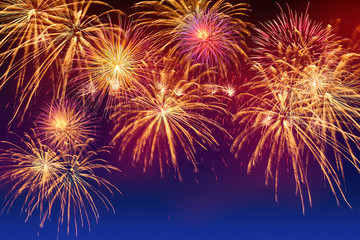 Fototapeta na wymiar Closed-up of fireworks background with gold fireworks.