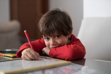 4 year old boy doing homework