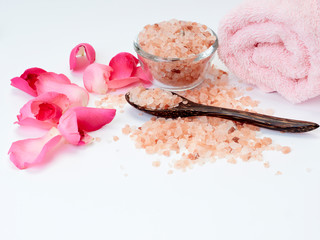 Spa of rose oil, pink himalayan salt.