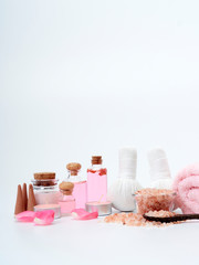 Spa of rose oil, pink himalayan salt.