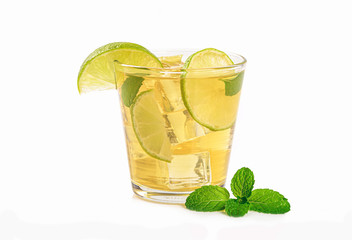 Lemonade glass with lemon and mint isolated on white background.