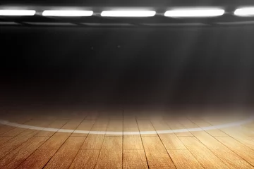  Close up view of a basketball court with wooden floor and spotlights © Leo Lintang
