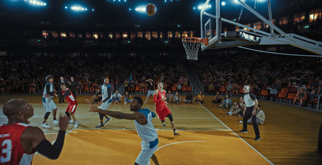Basketball players on big professional arena during the game. Tense moment of the game. Celebration