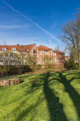 Fototapeta na wymiar Castle park and historic buildings in Jever, Germany